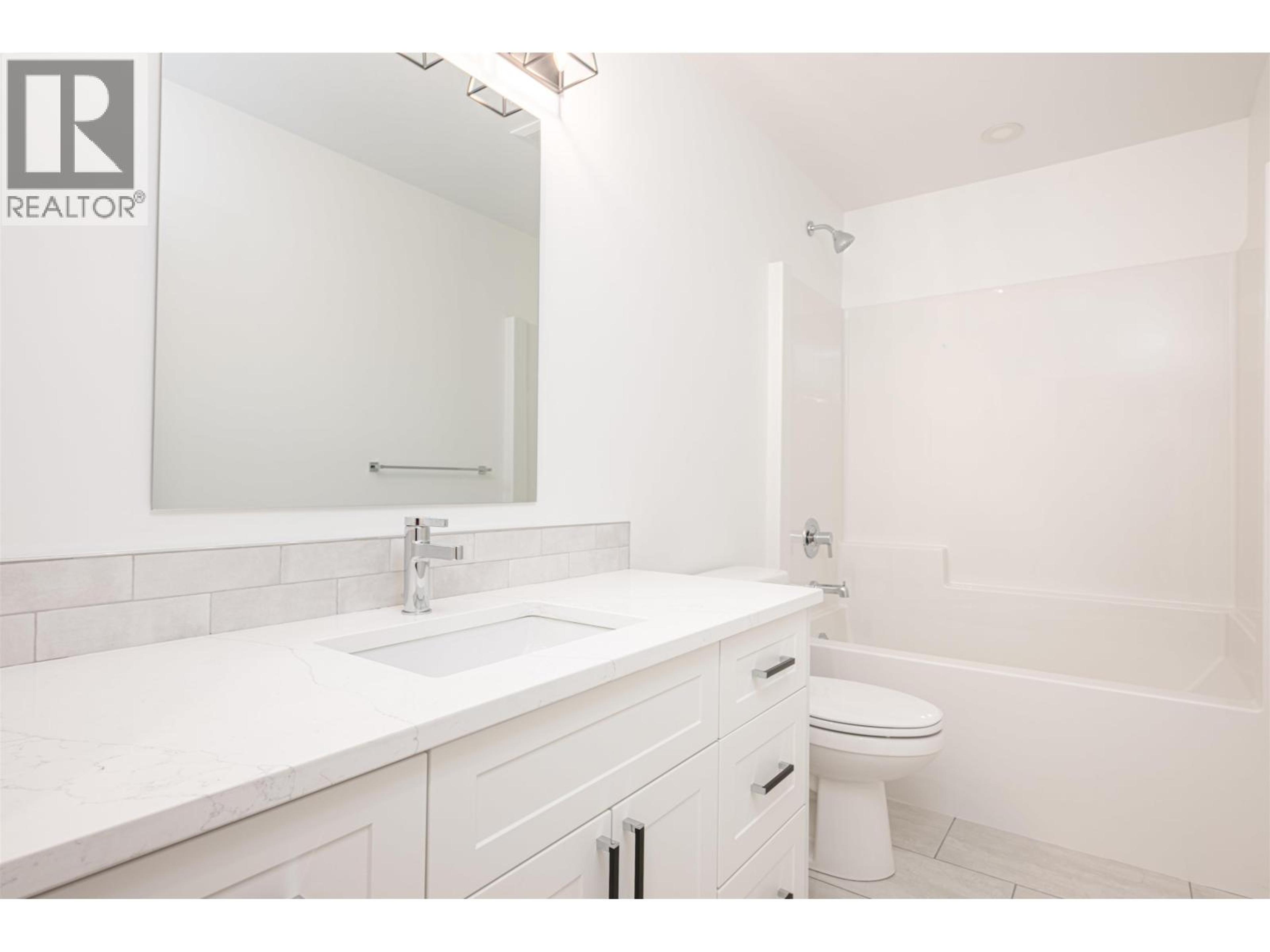 #102 7785 SOUTHRIDGE AVENUE - 23