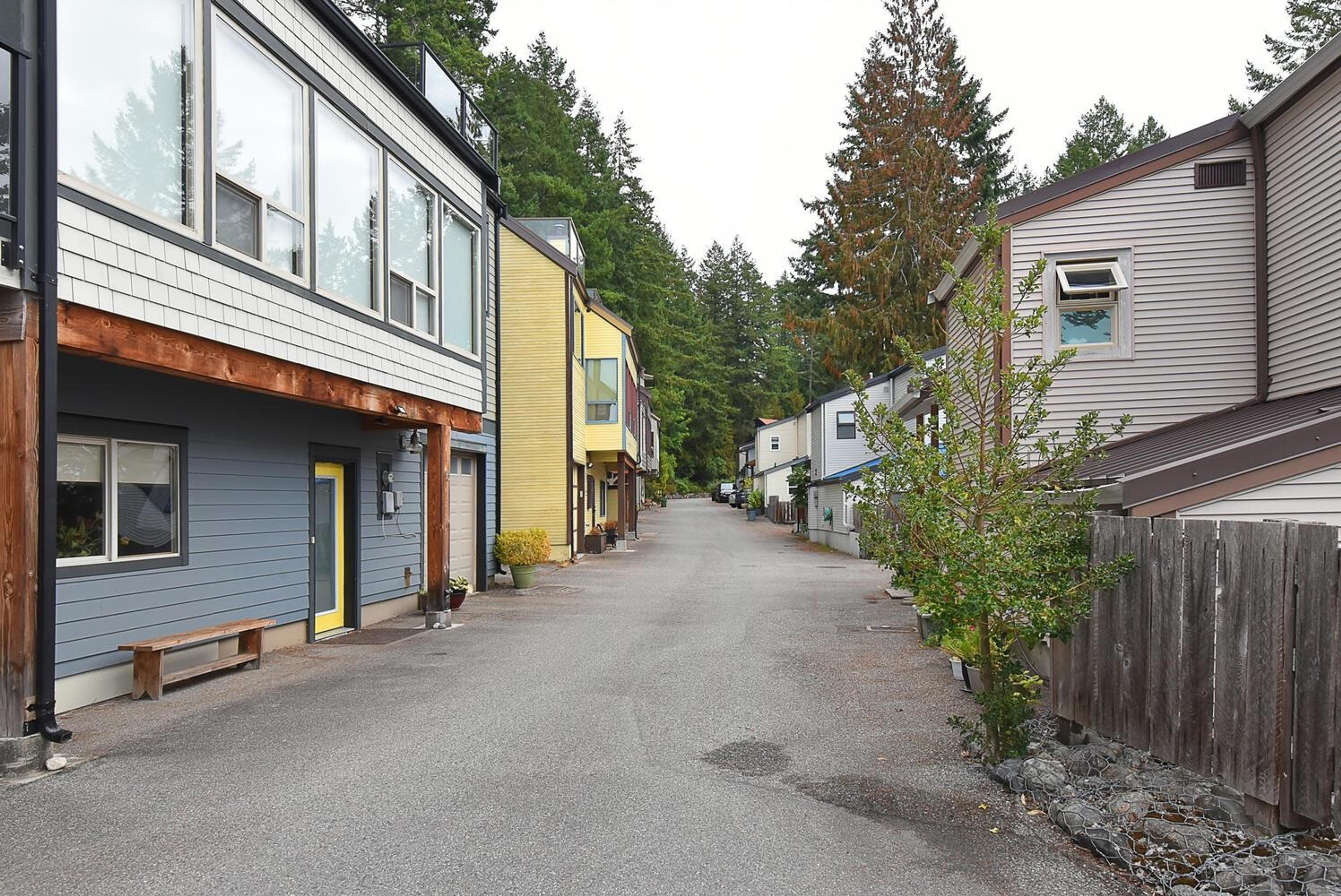 5471 Secret Cove Road, Halfmoon Bay - Exteriors - Full Complex View - Photo 2