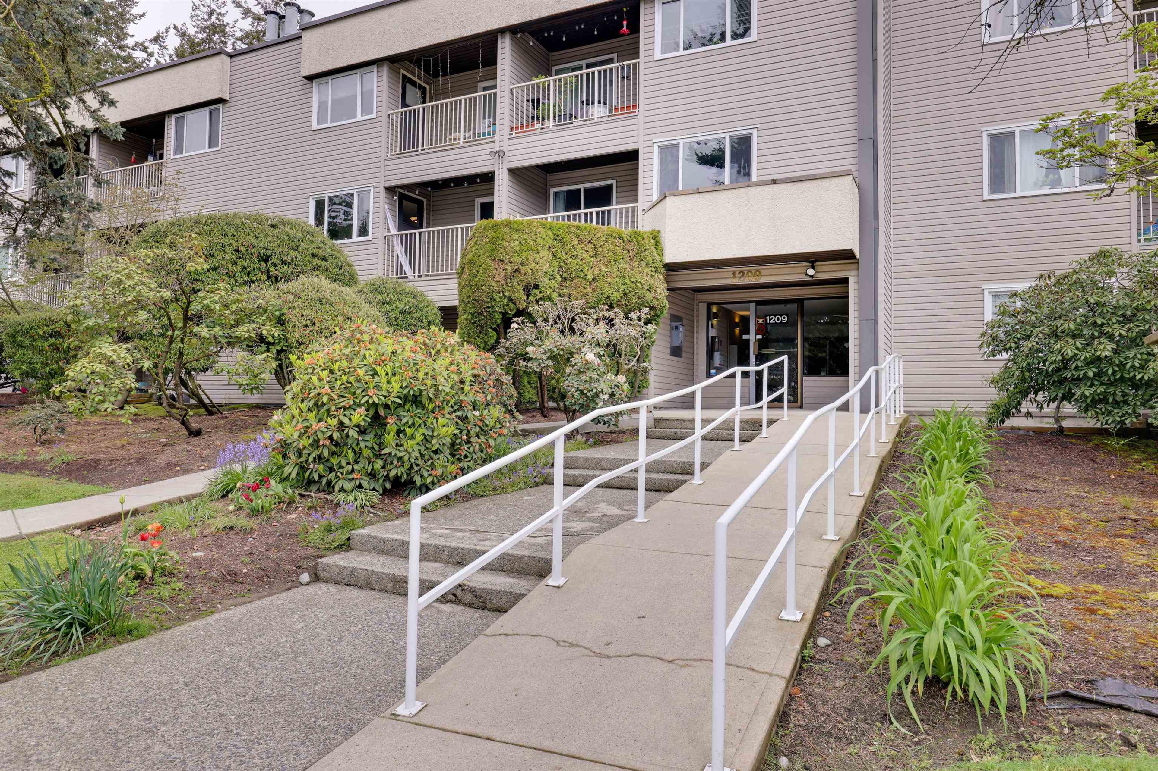 1209 Howie Avenue, Coquitlam - Exteriors - Photo 1