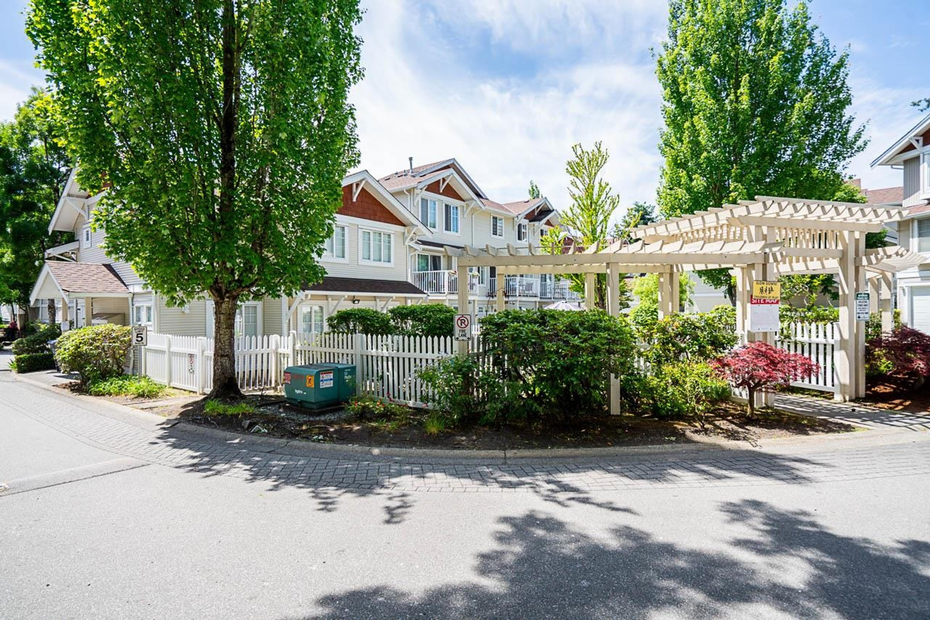 12110 75a Avenue, Surrey - Exteriors - Full Complex View - Photo 2