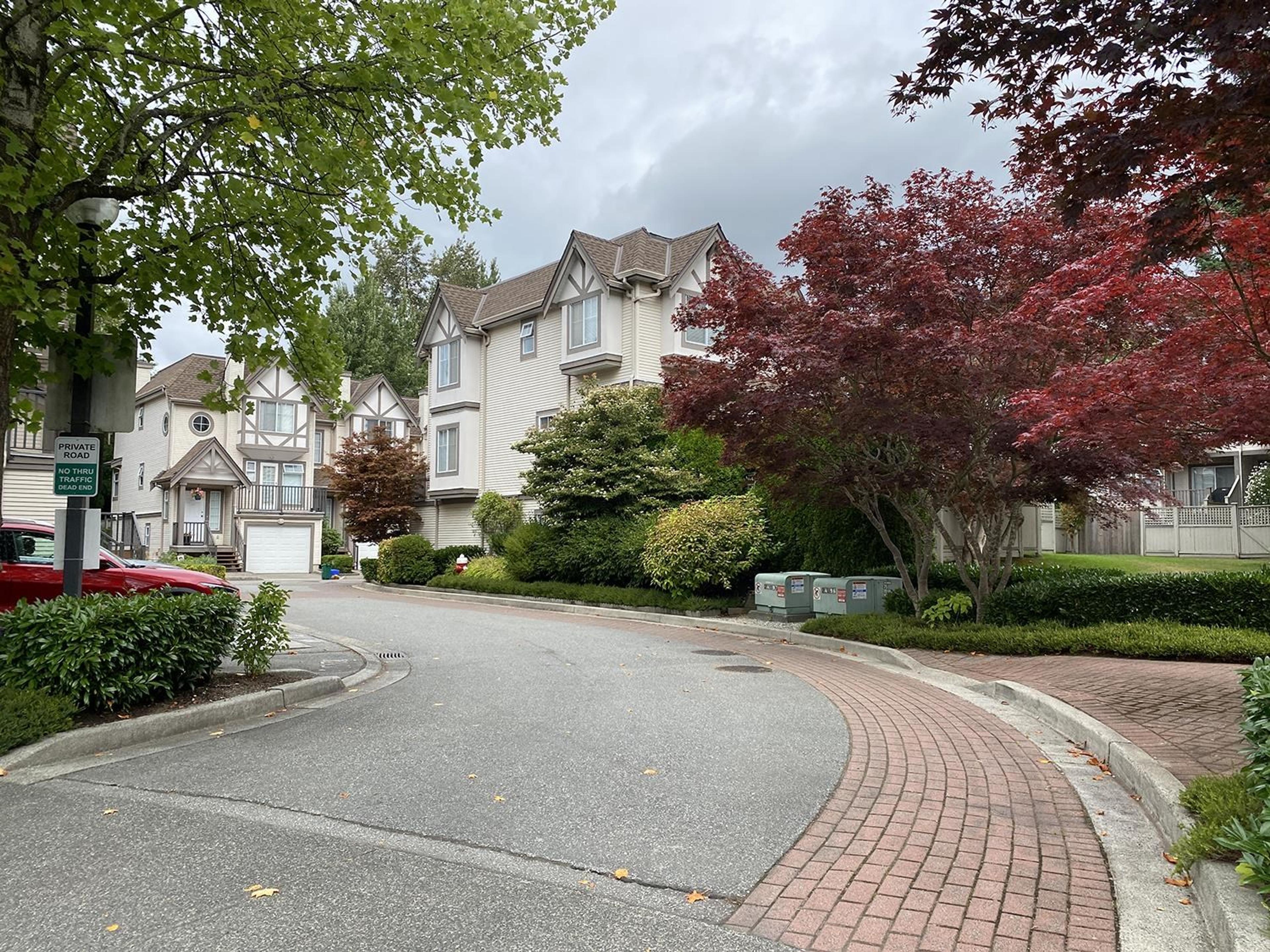 22711 Norton Court, Richmond - Exteriors - Full Complex View - Photo 1