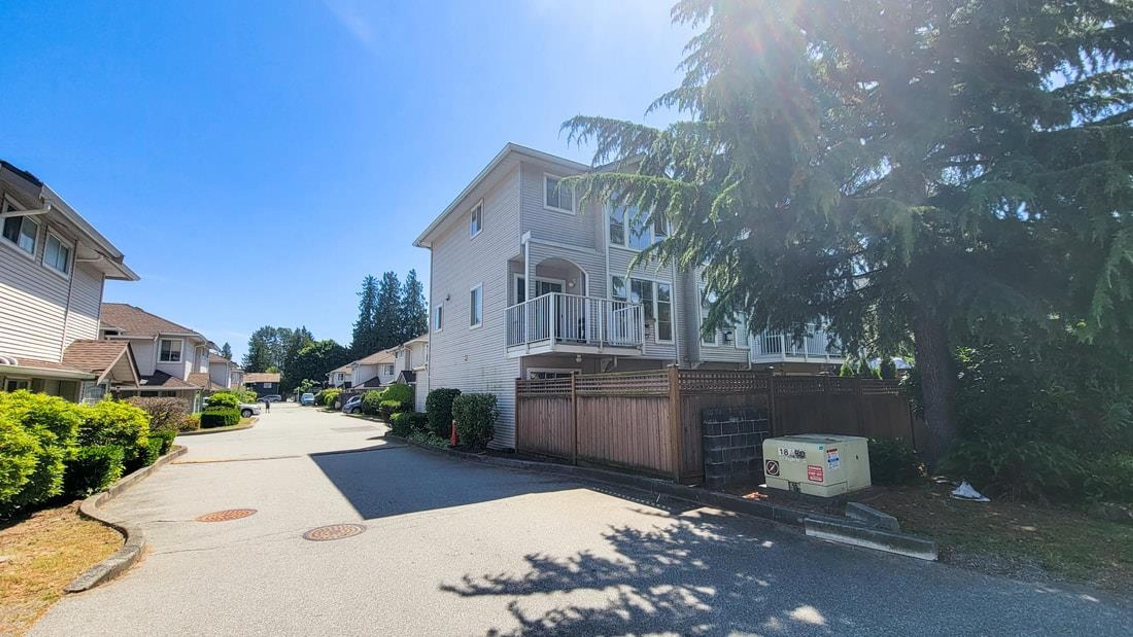 12188 Harris Road, Pitt Meadows - Exteriors - Full Complex View - Photo 1