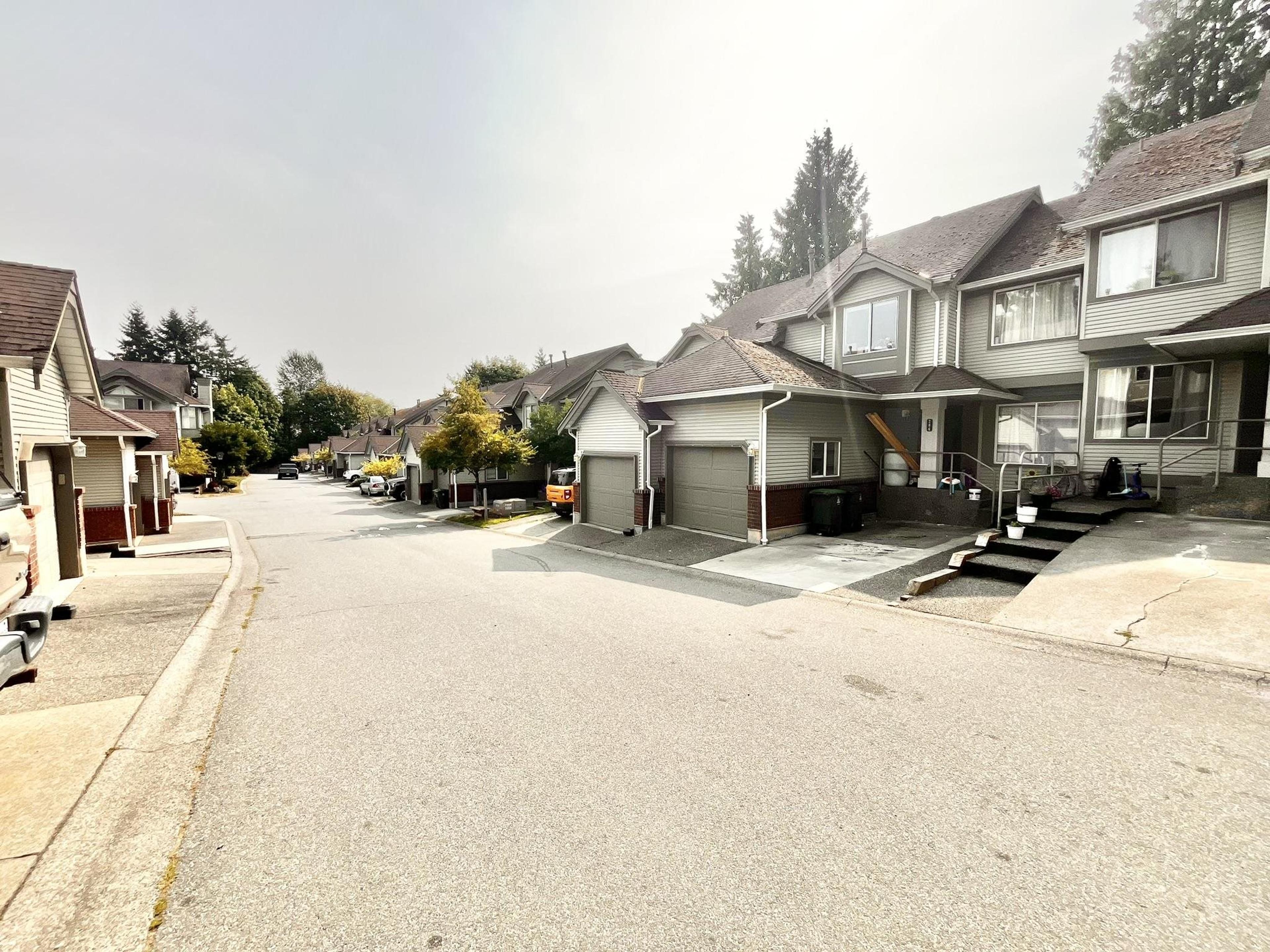 13900 Hyland Road, Surrey - Exteriors - Full Complex View - Photo 1