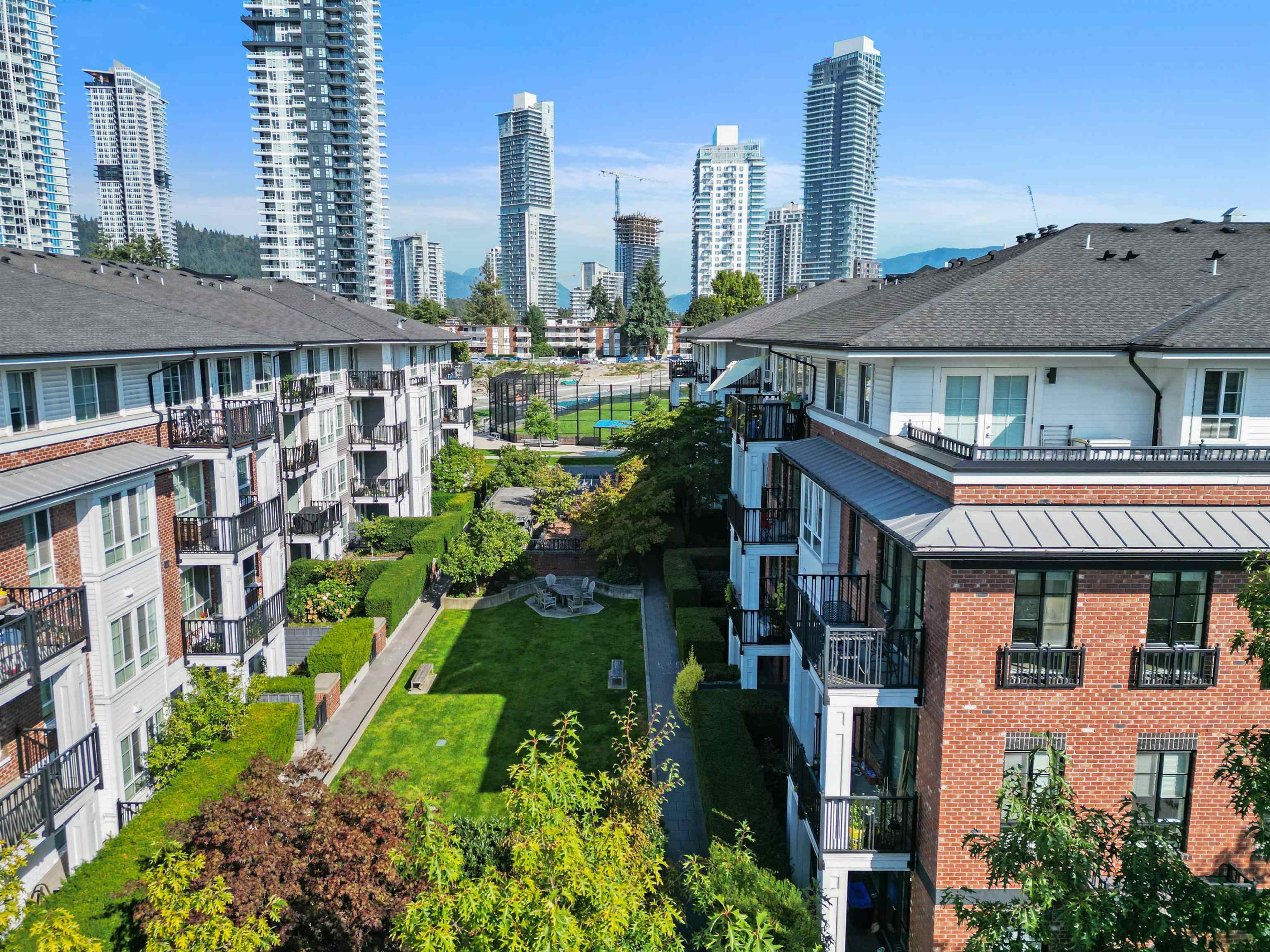 555 Foster Avenue, Coquitlam - Exteriors - Full Complex View, Drone/Aerial View - Photo 3