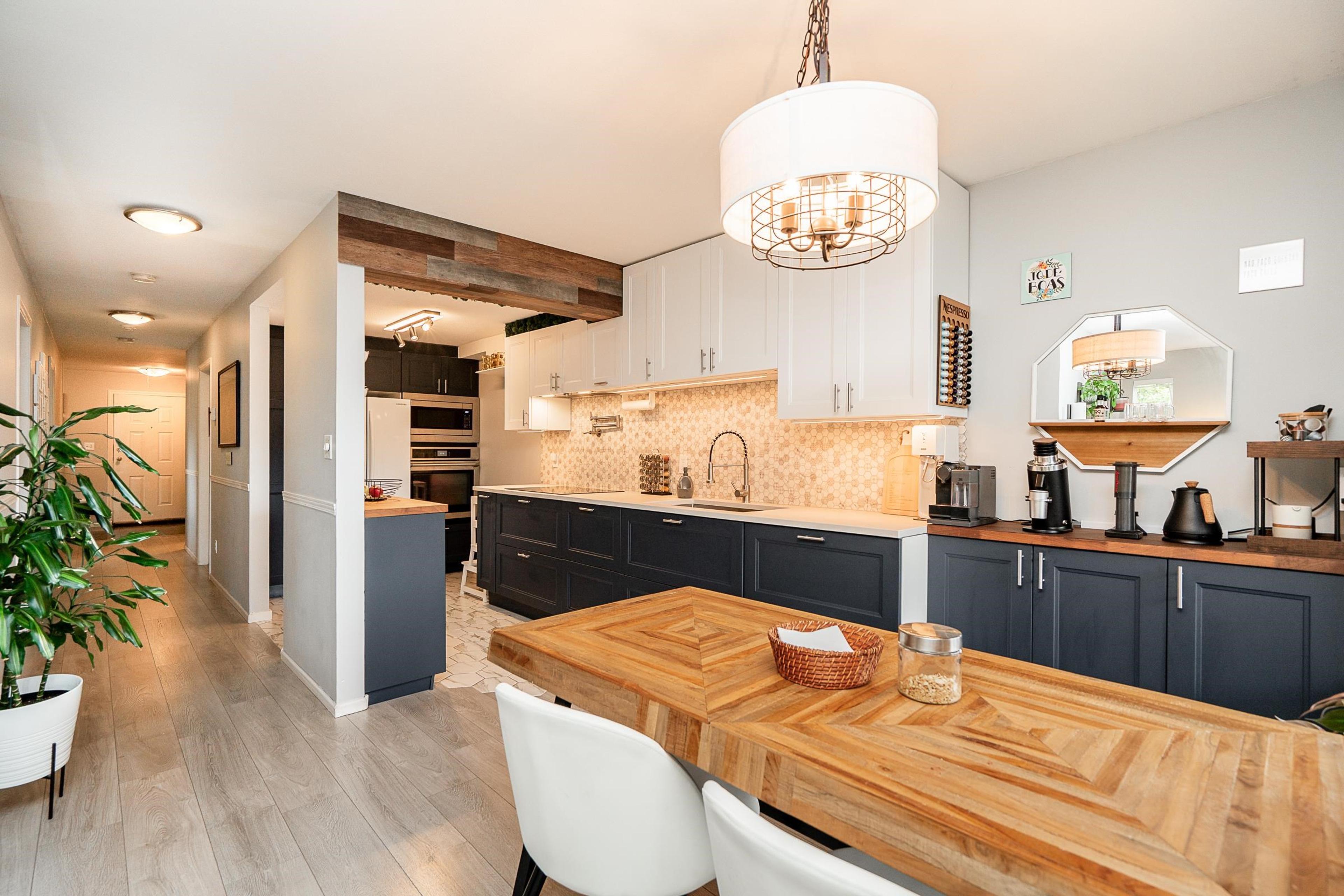 #301 7465 SANDBORNE AVENUE - Main Image