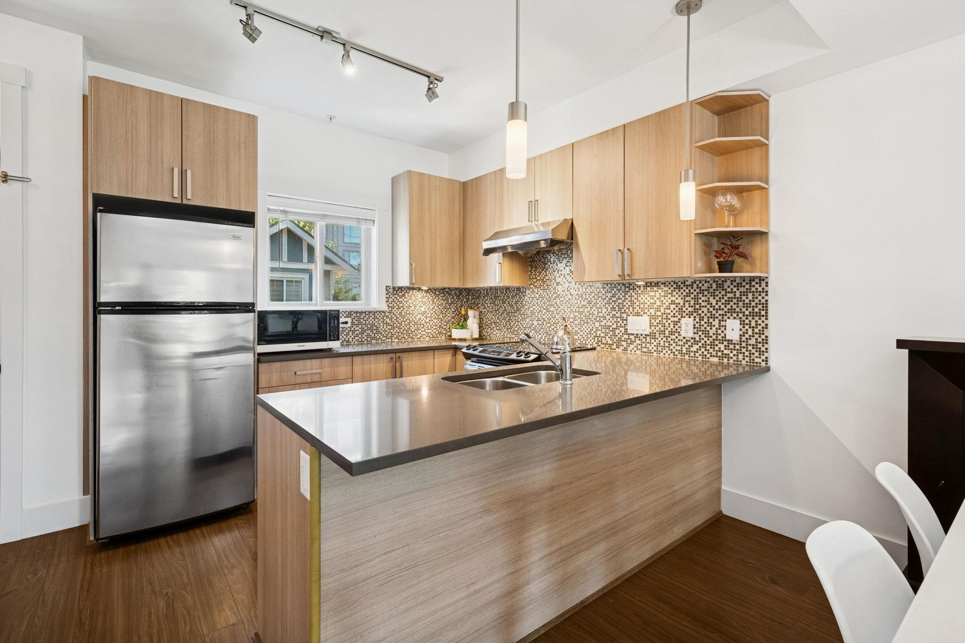 #203 7168 STRIDE AVENUE - Image 10