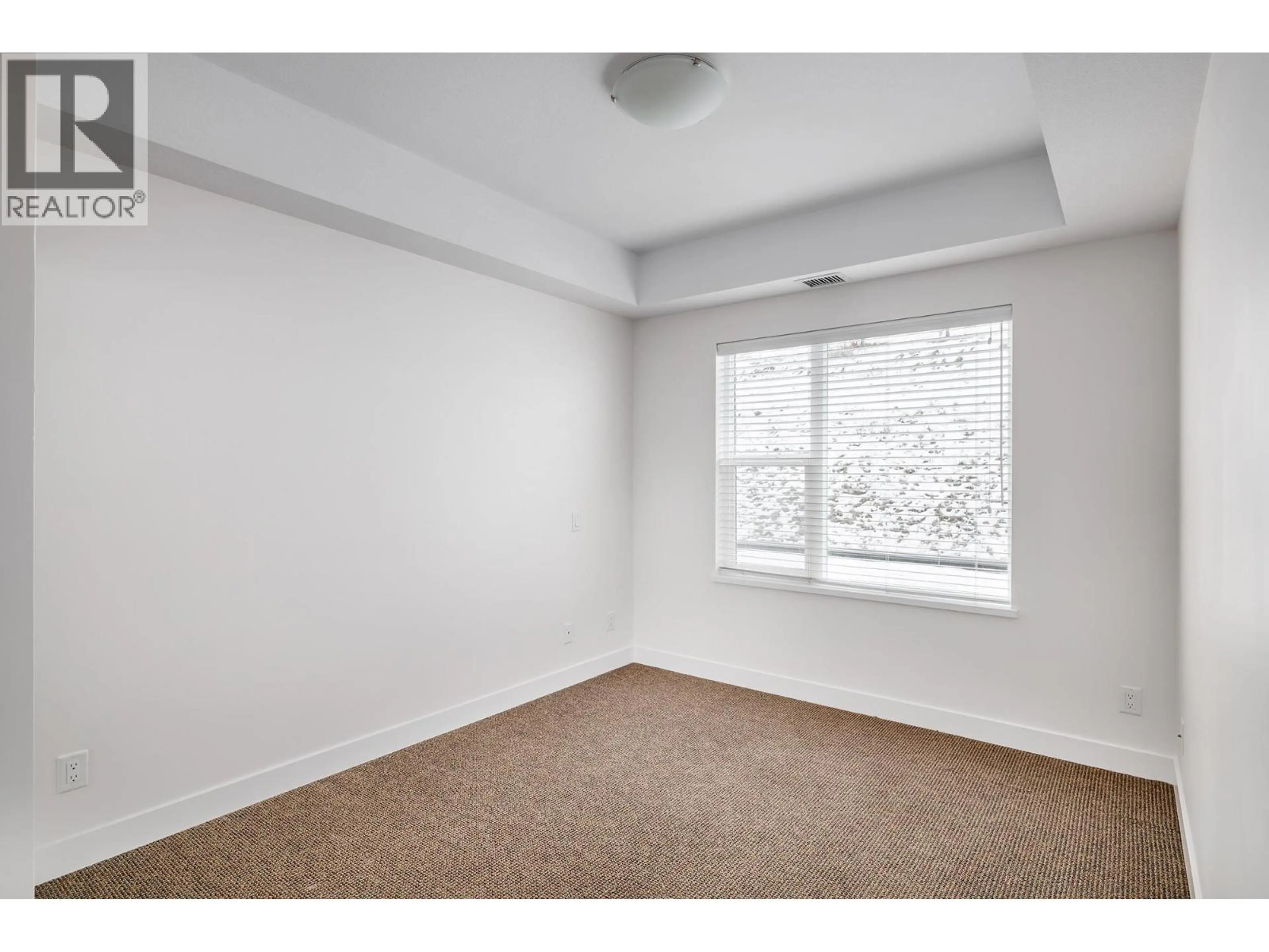 Property at #214 975 ACADEMY WAY, Kelowna, BC