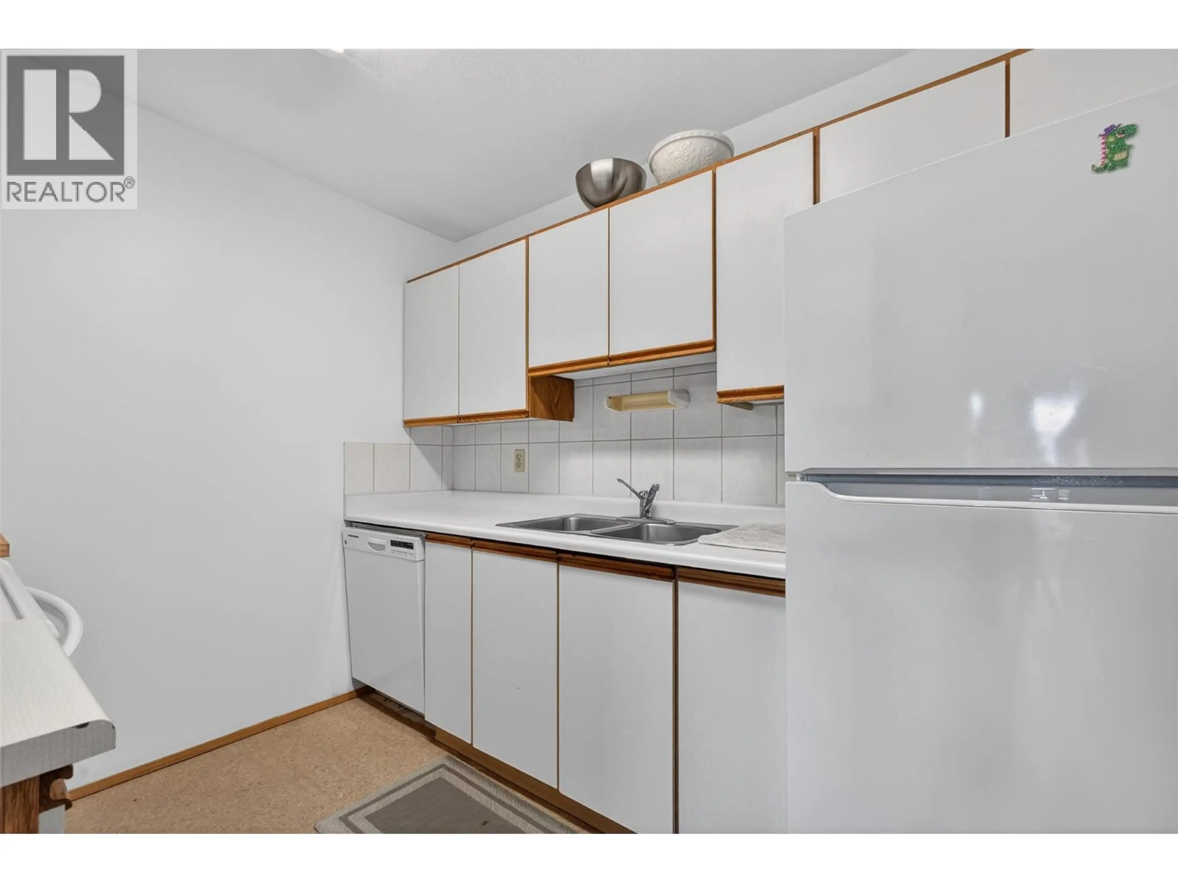 Property at #412 3180 DE MONTREUIL COURT, Kelowna, BC