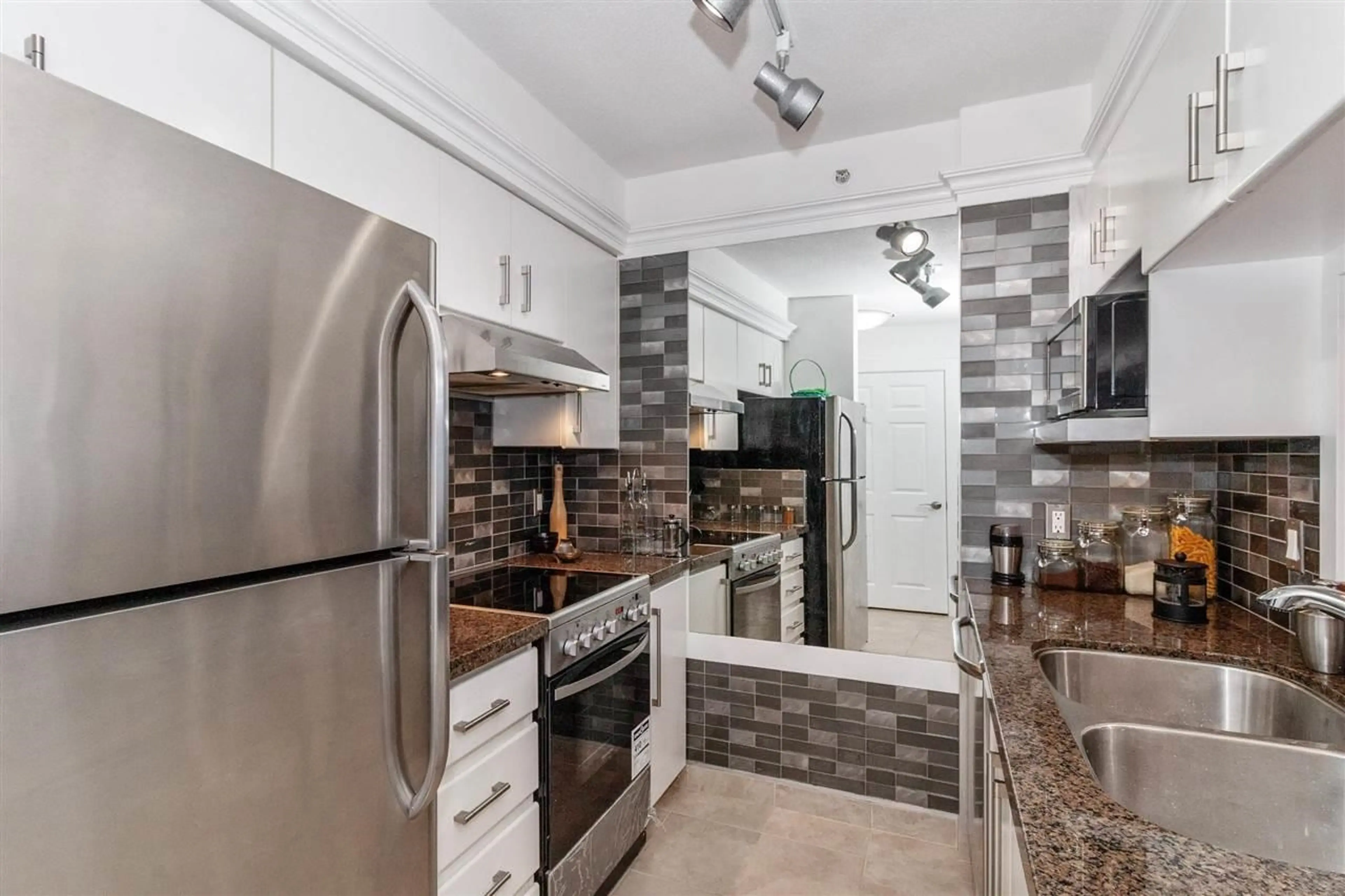 Property at #1001 3455 ASCOT PLACE, Vancouver, BC